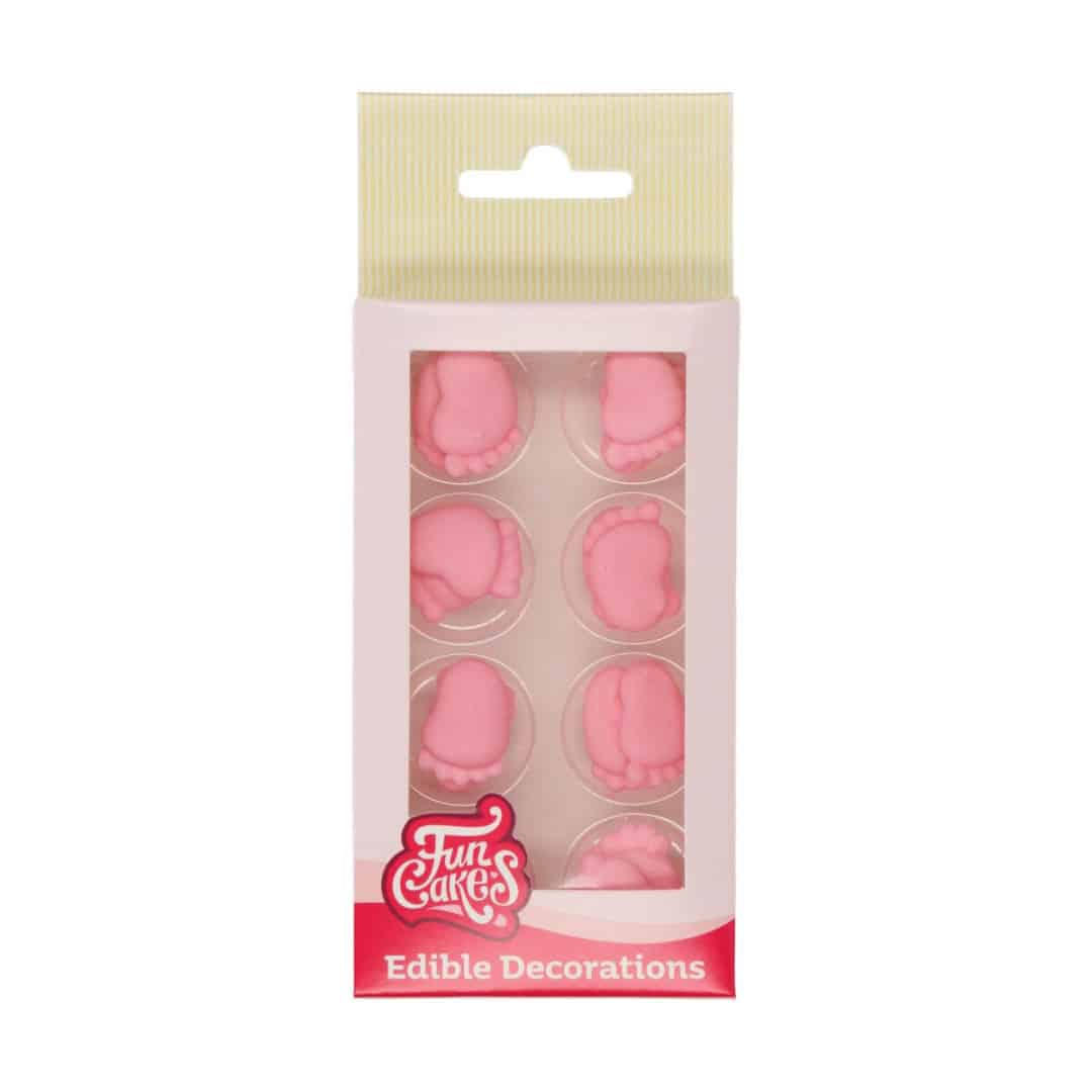 baby shower con i piedini rosa nella torta di zucchero