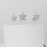 Candeline di compleanno con stella d'argento