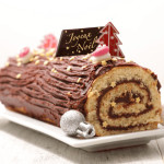 Buon Natale in cioccolato al cioccolato sul tronco