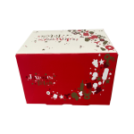 scatola per mini tronchetto di Natale rossa e bianca con la scritta “Buone Feste”